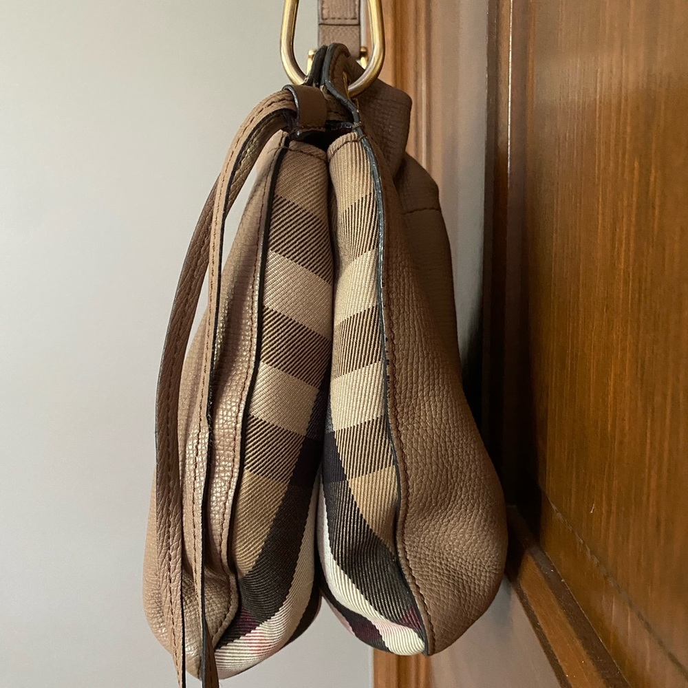 Authentic Burberry leather and check drawstring bag with duster